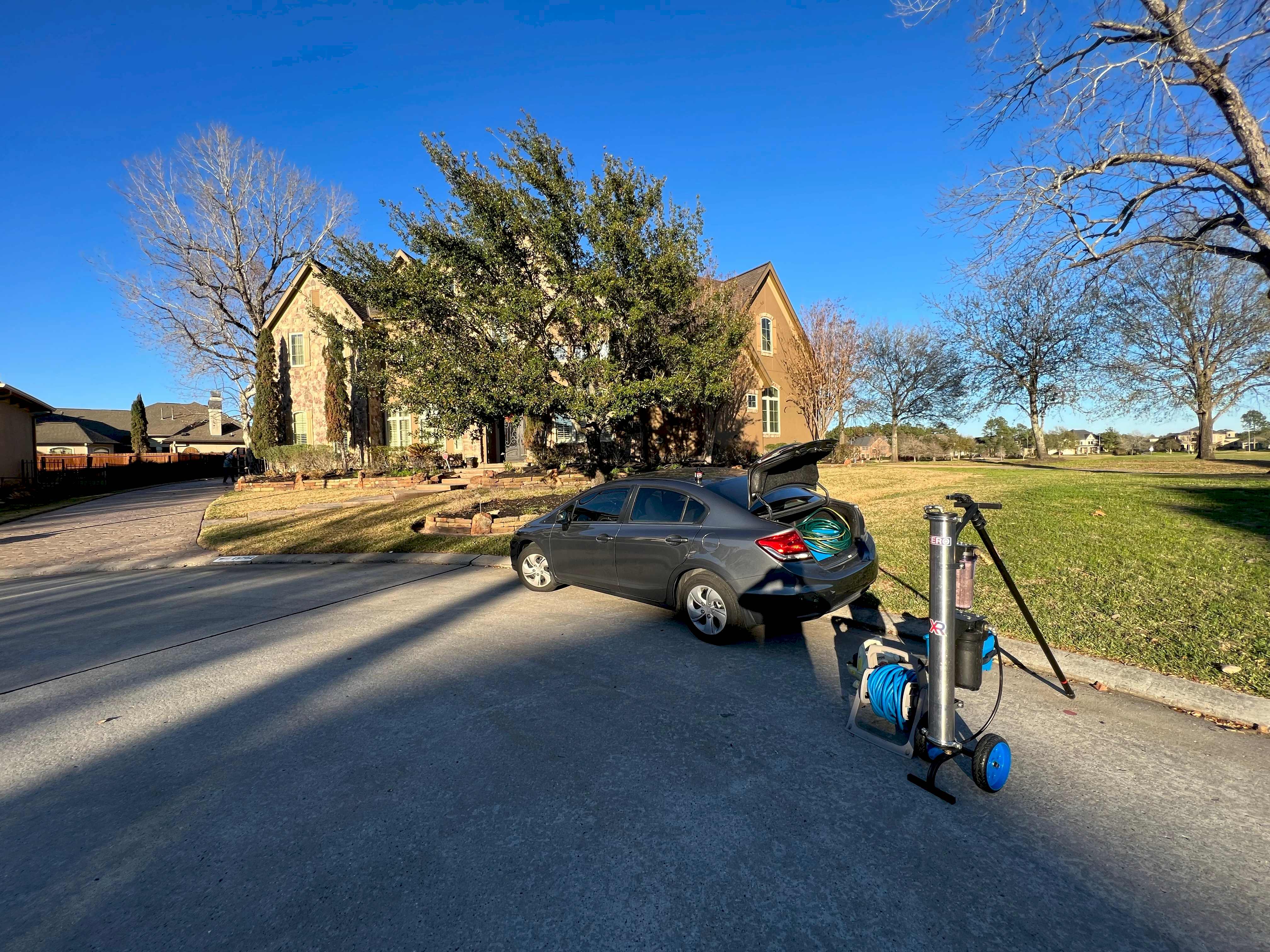 The Honda Civic Window Warriors founder Will started the company out of, packed with cleaning equipment