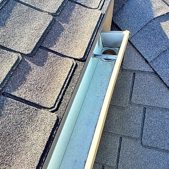 Clean, debris-free gutter after professional gutter cleaning